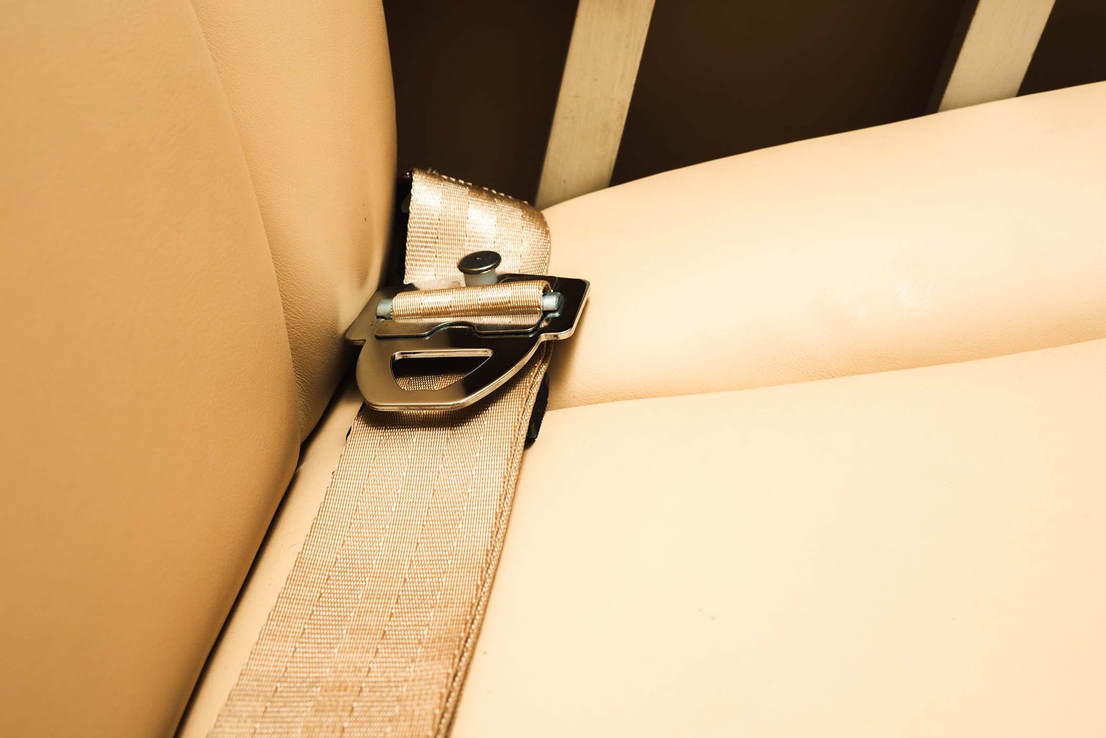Closeup of seatbelt of Privatelink Aviation King Air.